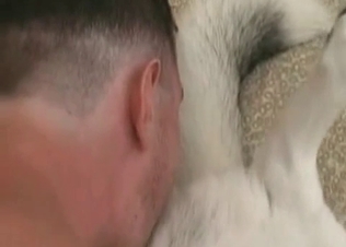 Kinky zoophile finger-blasting a dog